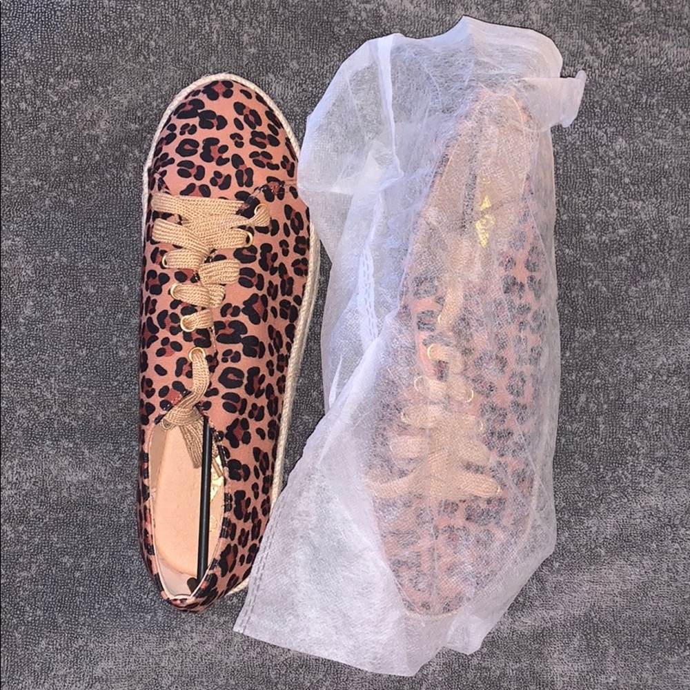 Never worn cheetah print platform shoes